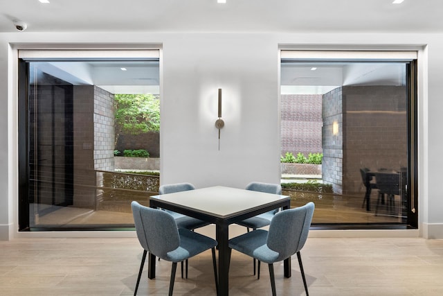 245 E 93rd St Unit 2E, New York City, NY 10128 - dining area with healthy amount of natural light and recessed lighting