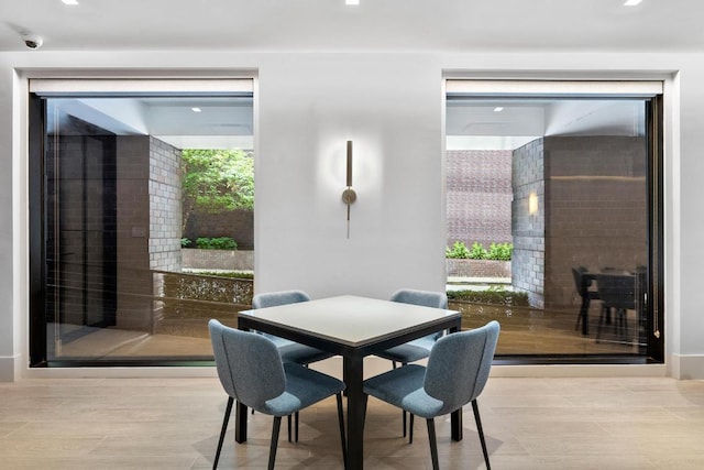 dining room with light hardwood / wood-style floors