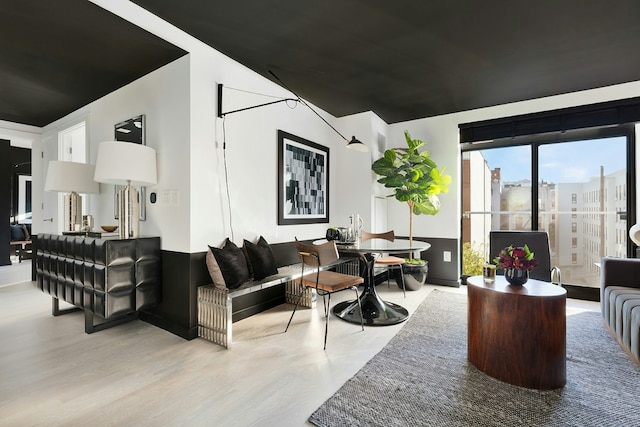 interior space featuring a view of city and wood finished floors