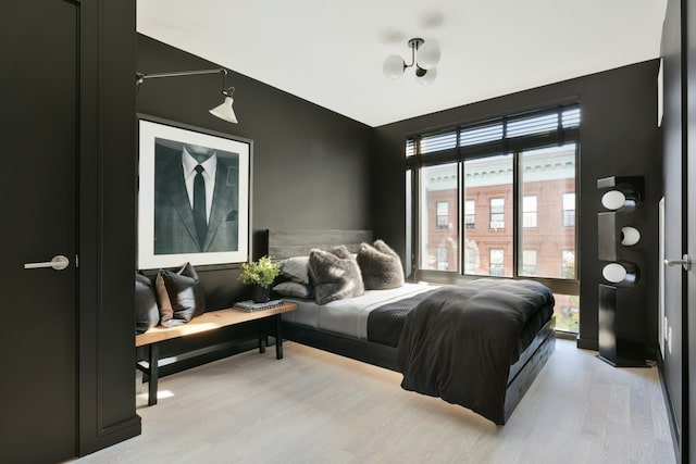 bedroom with light wood-type flooring