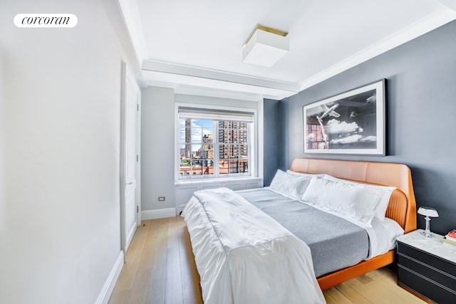 141 E 88th St Unit 10A, New York City, NY 10128 - bedroom featuring crown molding and light wood-type flooring