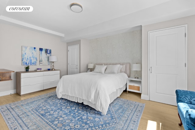 bedroom with light hardwood / wood-style flooring