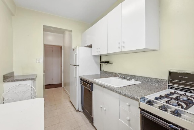 bathroom with vanity, tile patterned flooring, and plus walk in shower