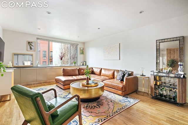 living room with light hardwood / wood-style floors