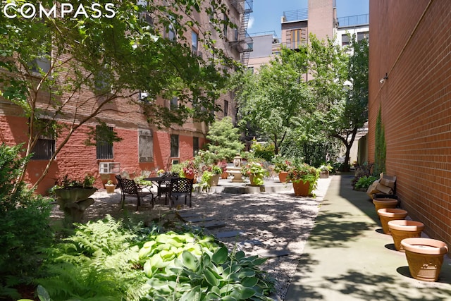 view of home's community with a patio