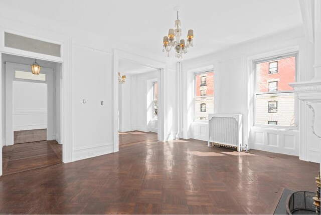 interior space featuring hardwood / wood-style flooring and stainless steel fridge