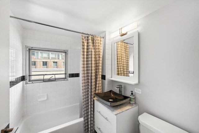 full bathroom featuring vanity, toilet, and shower / bath combo