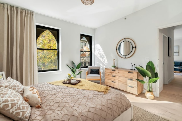 bedroom with light hardwood / wood-style floors