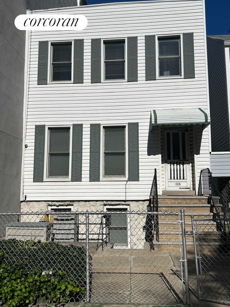 189 13th St, New York City, NY 11215 - multi unit property with a fenced front yard and a gate