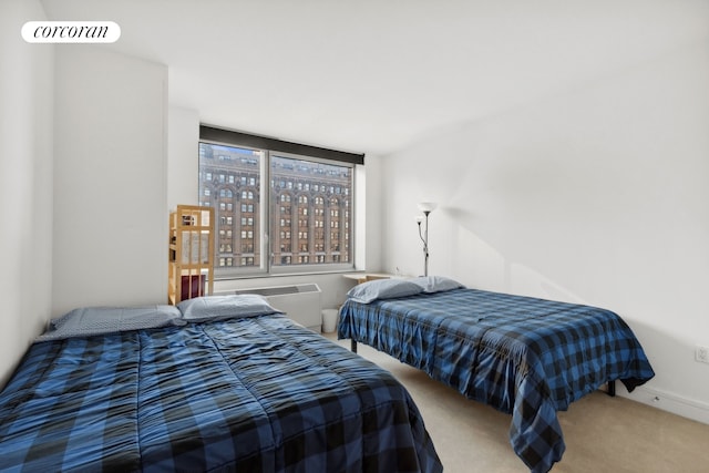 carpeted bedroom with baseboards and visible vents