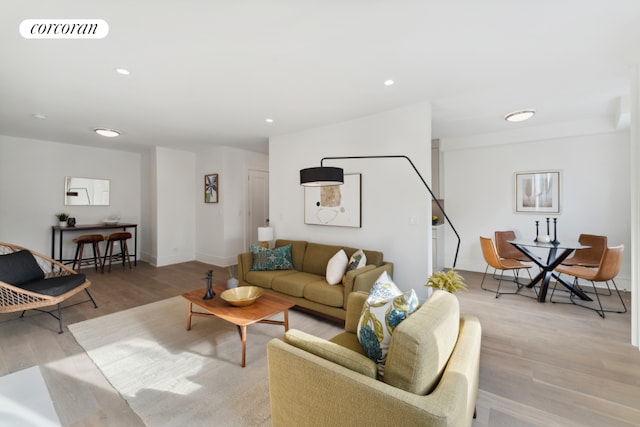 living room with light hardwood / wood-style floors