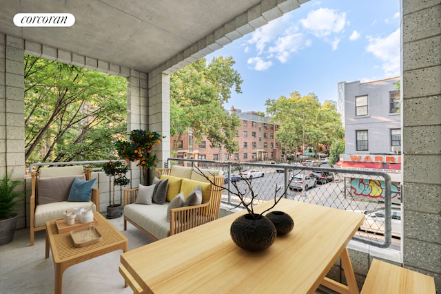 balcony with an outdoor hangout area