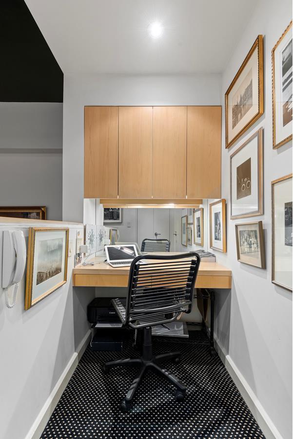 office space with baseboards