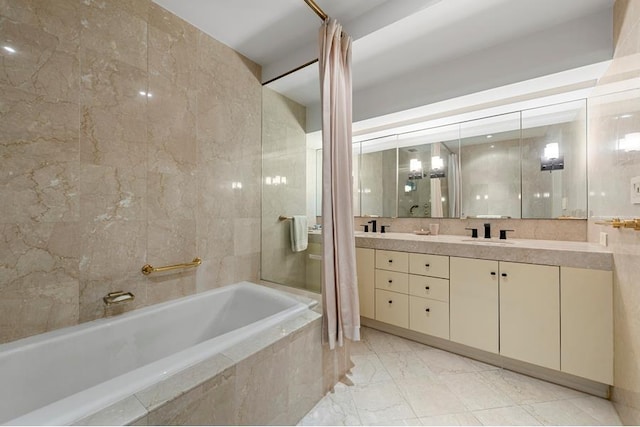 bathroom featuring tile walls, marble finish floor, and vanity