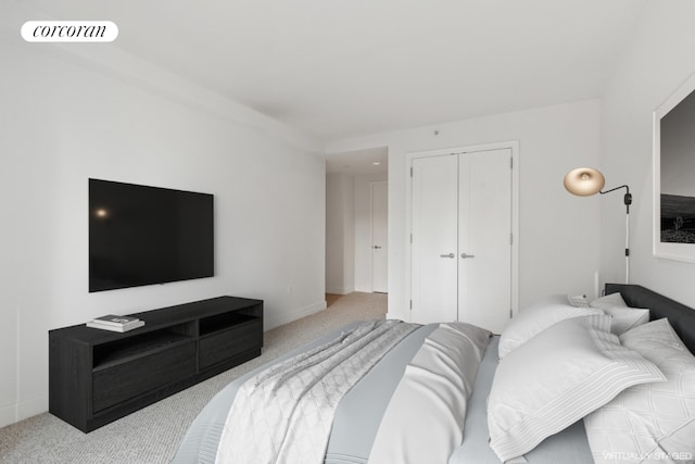 carpeted bedroom with a closet