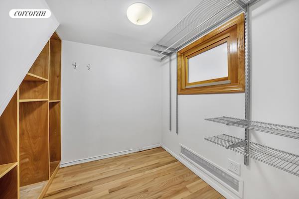 walk in closet with light wood-style floors and visible vents