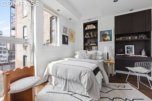 bedroom featuring hardwood / wood-style flooring