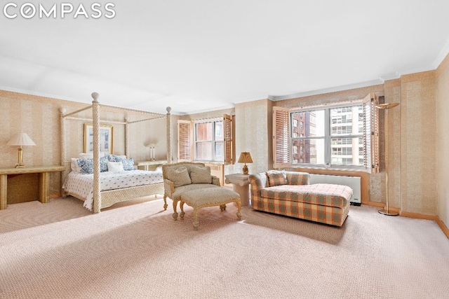 carpeted bedroom with ornamental molding