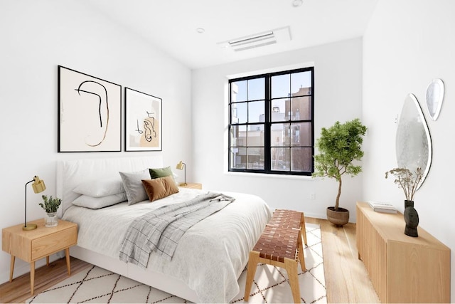 bedroom featuring light wood-type flooring