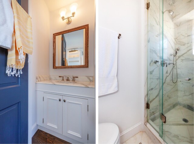 1040 Park Ave Unit 12G2, New York City, NY 10028 - bathroom with a marble finish shower, vanity, toilet, and baseboards