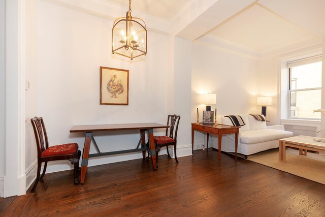 1040 Park Ave Unit 12G2, New York City, NY 10028 - sitting room featuring a chandelier, dark wood-style floors, and baseboards