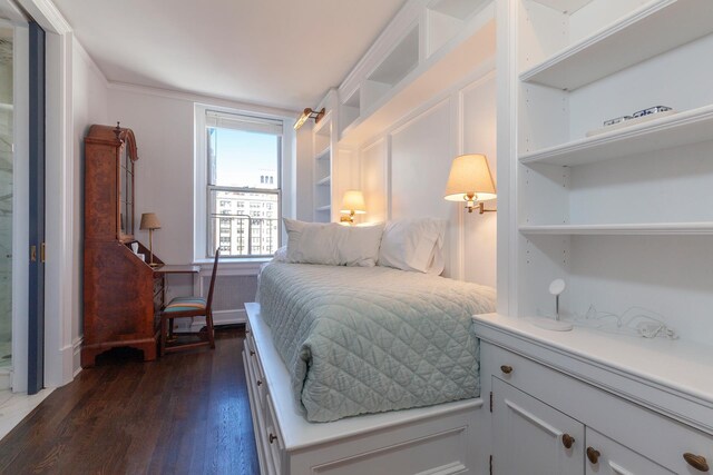 1040 Park Ave Unit 12G2, New York City, NY 10028 - bedroom featuring dark wood-type flooring