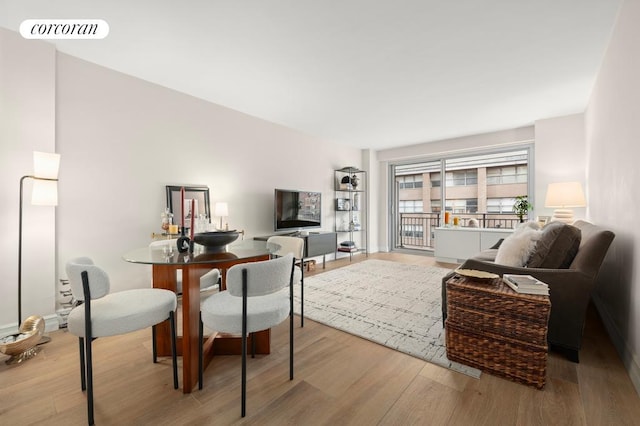 living room with light hardwood / wood-style floors