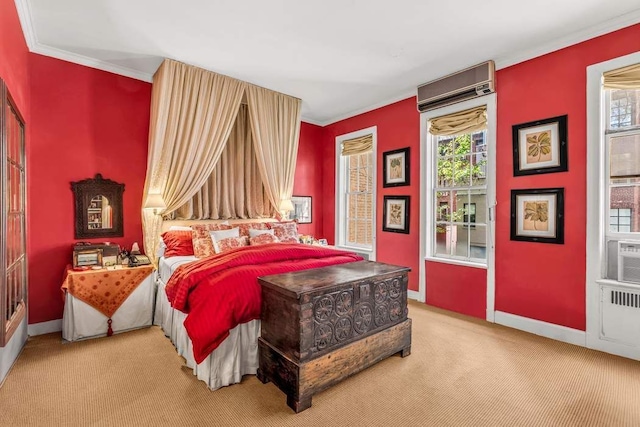 carpeted bedroom with ornamental molding, a wall unit AC, and baseboards