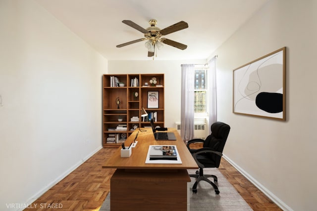 home office with ceiling fan and parquet floors