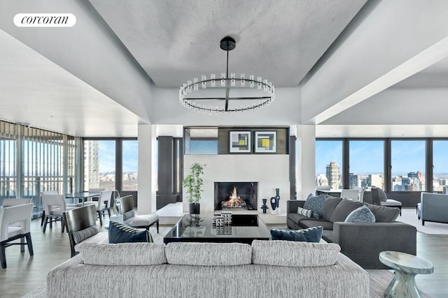 living room with hardwood / wood-style flooring and plenty of natural light