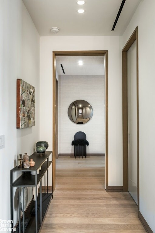 living room with floor to ceiling windows