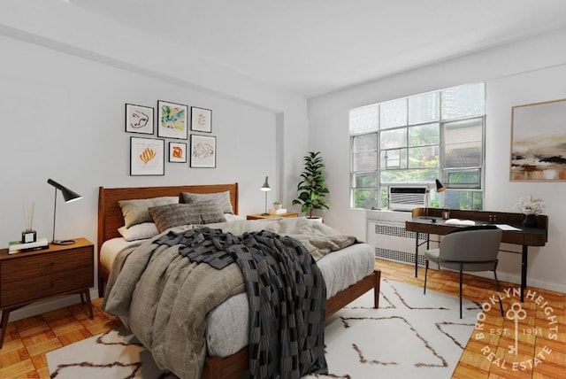 bedroom featuring cooling unit and radiator heating unit