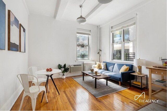 dining space with hardwood / wood-style flooring