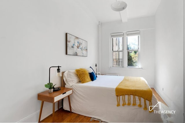 bedroom featuring hardwood / wood-style flooring