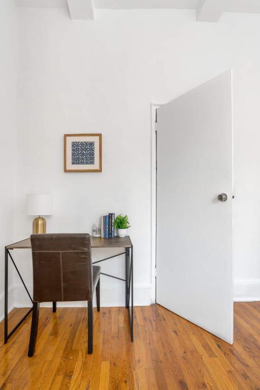 hallway featuring wood-type flooring