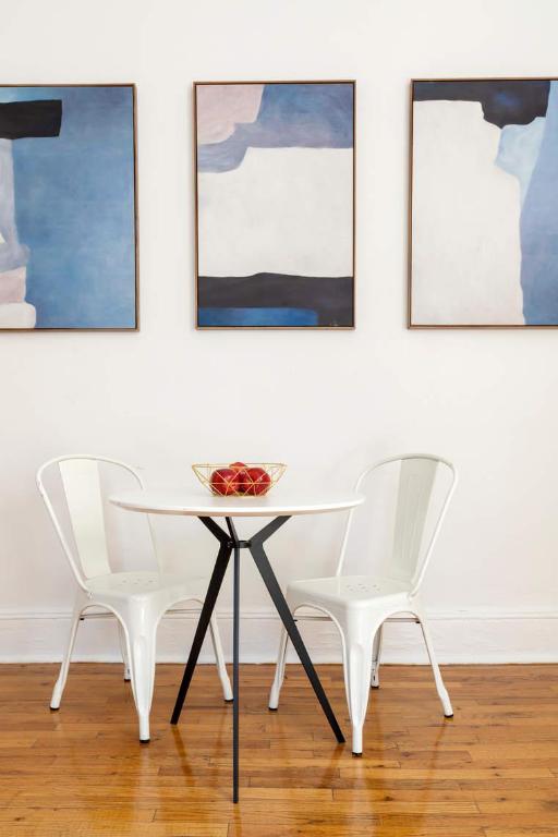 dining area with hardwood / wood-style floors