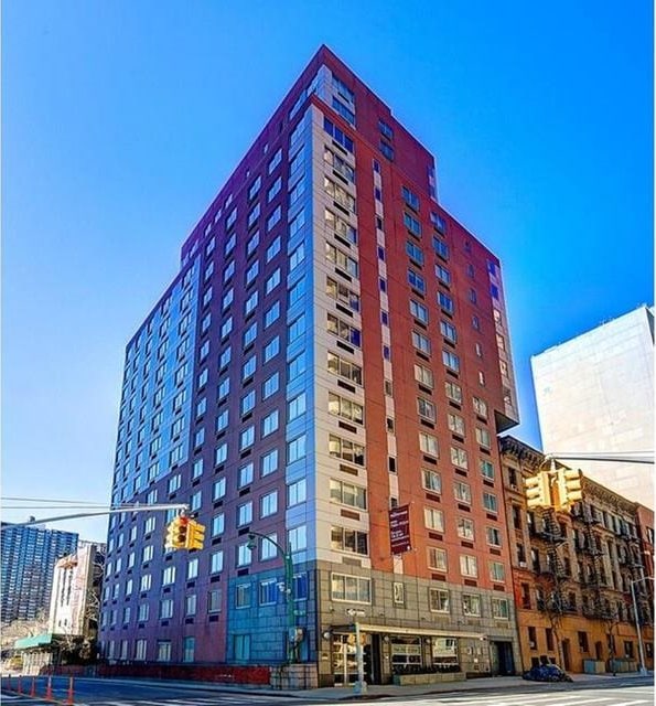 view of building exterior featuring a view of city