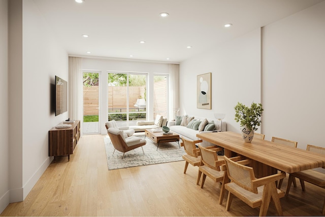 living area featuring recessed lighting, baseboards, and light wood finished floors