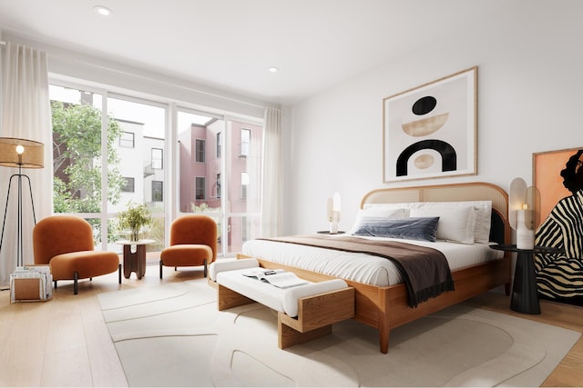 bedroom featuring recessed lighting and wood finished floors
