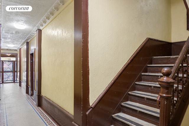 interior space featuring a textured ceiling