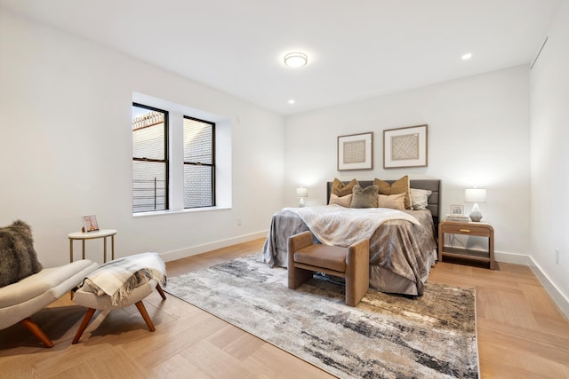 bedroom with recessed lighting, baseboards, and light wood-style floors