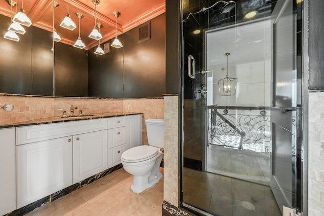 full bath featuring tile walls, visible vents, toilet, a shower stall, and vanity