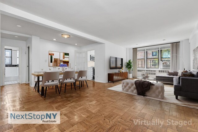 living room with light parquet floors