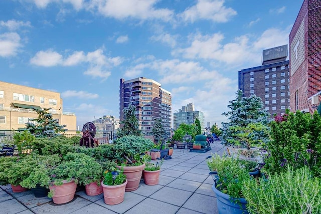 view of property's community with a patio area