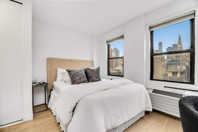 bedroom featuring light hardwood / wood-style floors