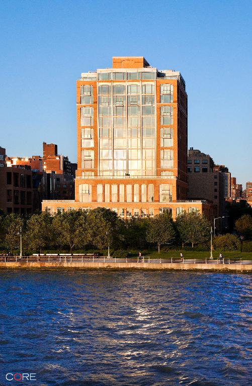 view of building exterior featuring a water view