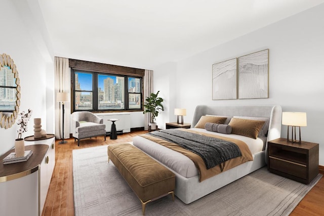 bedroom featuring wood finished floors