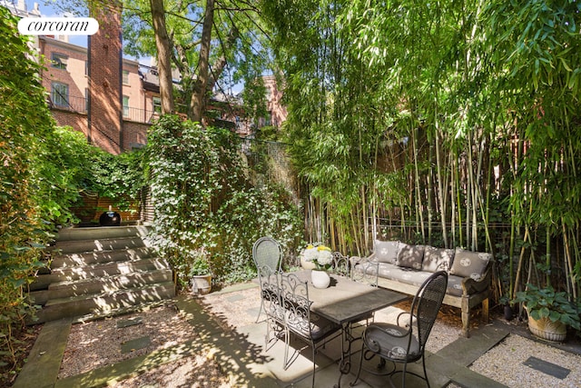 view of patio / terrace featuring fence and an outdoor living space