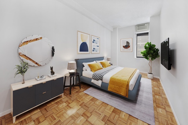 bedroom featuring baseboards