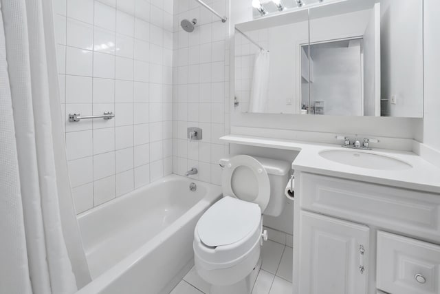 full bath with vanity, tile patterned floors, toilet, and shower / bath combo